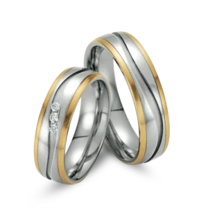 Anillos de matrimonio con piedras de oro y oro blanco.